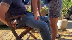 Melanie comes over to give me a blowjob on the terrace