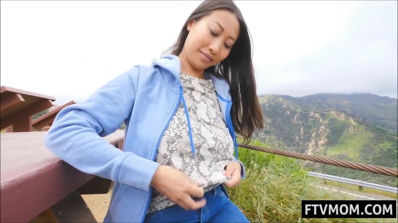 Mymy Ibn revealing her curves in the open air