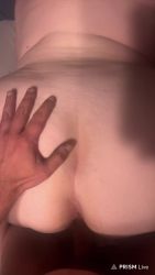 Vertical phone view of a curvy brunette taking it from behind